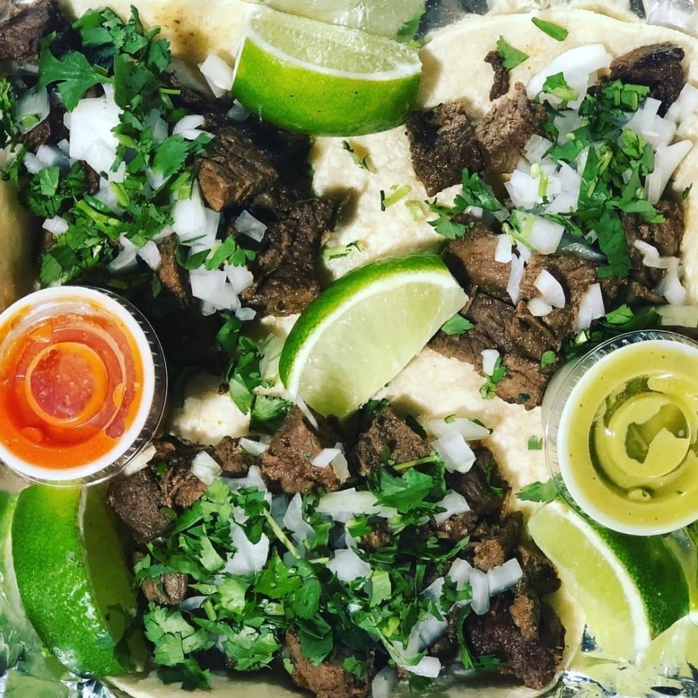Carne asada street tacos ($3.75 each) are grilled, citrus-season steak on corn tortillas with onions and cilantro. (Courtesy Mikey V's)