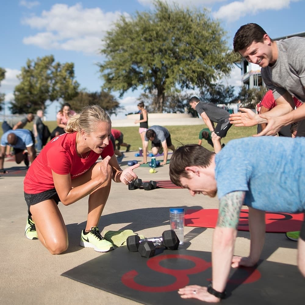 Davidson (left) pictured above leading a Camp Gladiator outdoor class. 