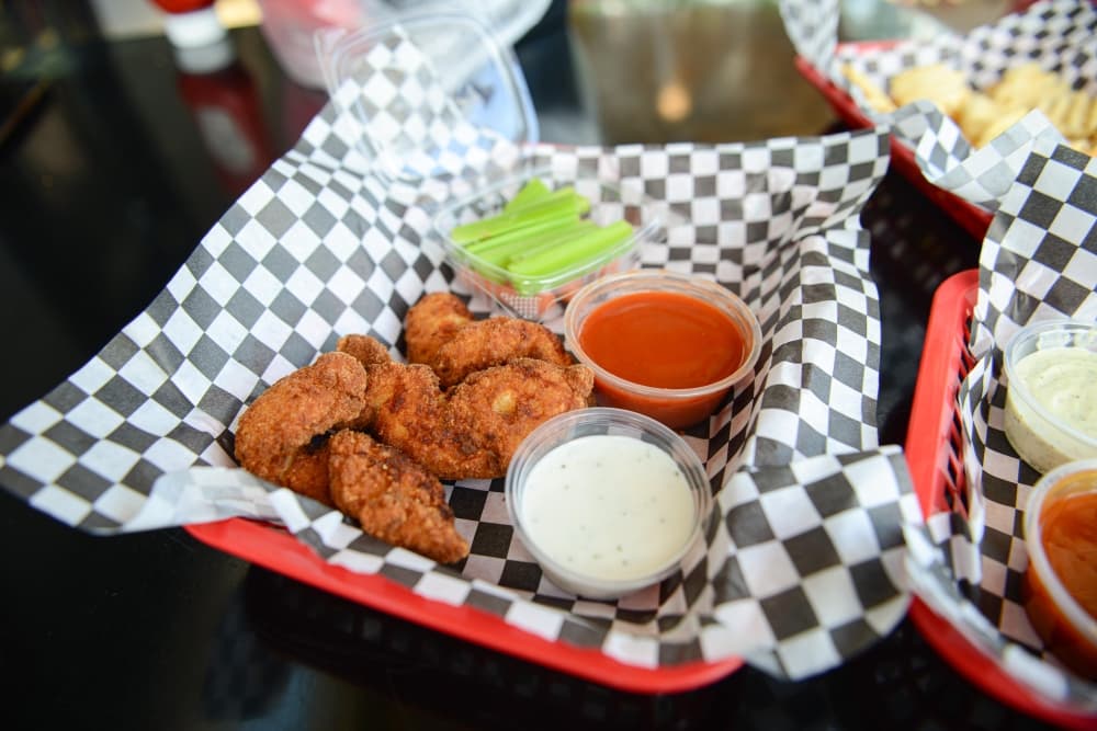Chicken tenders are available in three, six or 12 pieces ($5.25-$15.95) and can be paired with a selection of sauces. (Ethan Pham/Community Impact Newspaper)