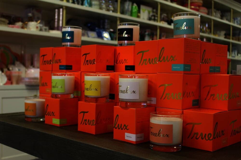 The store sells Truelux Candles, two-in-one candles and lotions poured in Tomball. (Chandler France/Community Impact Newspaper)