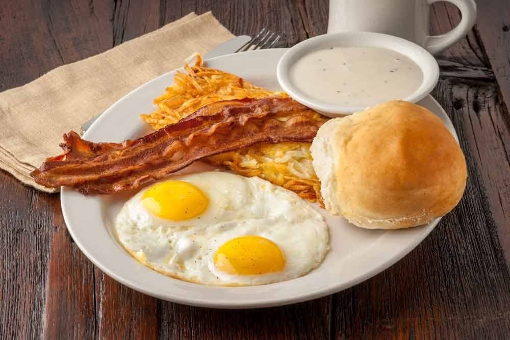 The Traditional ($8.99) is served with two eggs cooked to order, bacon, sausage or ham, hash browns, a biscuit and gravy. (Courtesy Jakes Burgers and Beer)