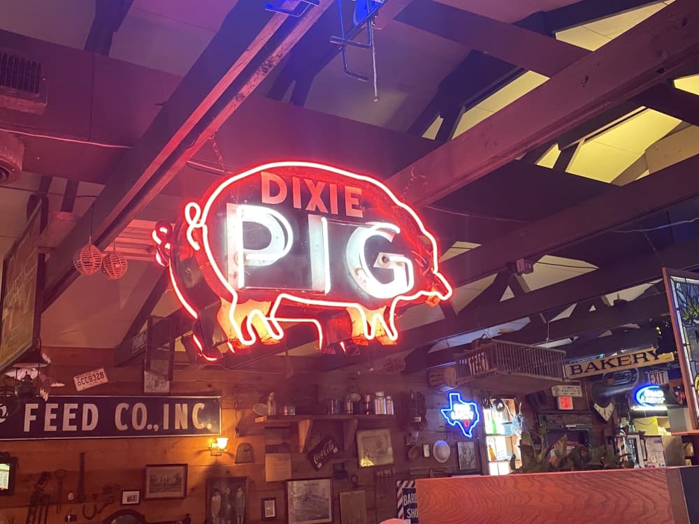 Springhill owner Carroll Humphrey said he purchased this sign from an auction. (Brooke Sjoberg/Community Impact Newspaper)