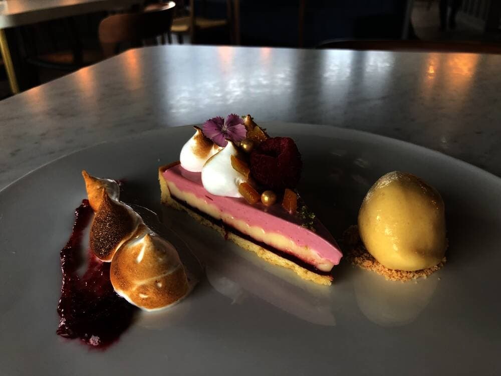 Le Vacher desserts vary with seasonally available ingredients. This July special brought a raspberry-based sweet. (Community Impact Newspaper/Maggie Quinlan)