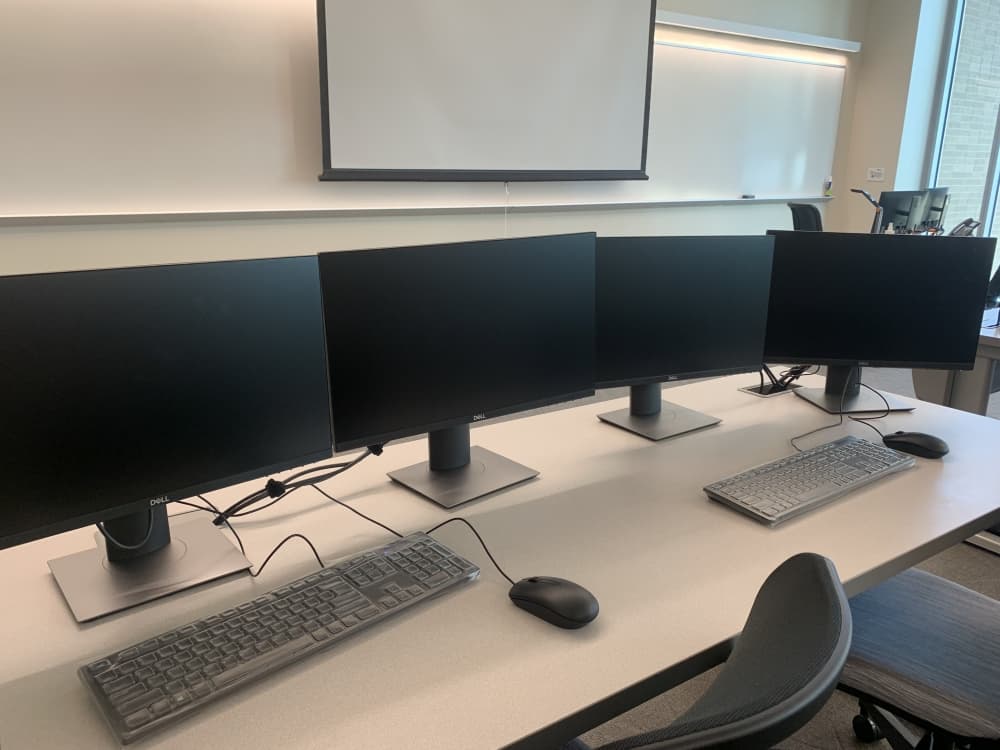Students in Collin College's Cloud Computing program use double monitors for assignments. (Brooklynn Cooper/Community Impact Newspaper)