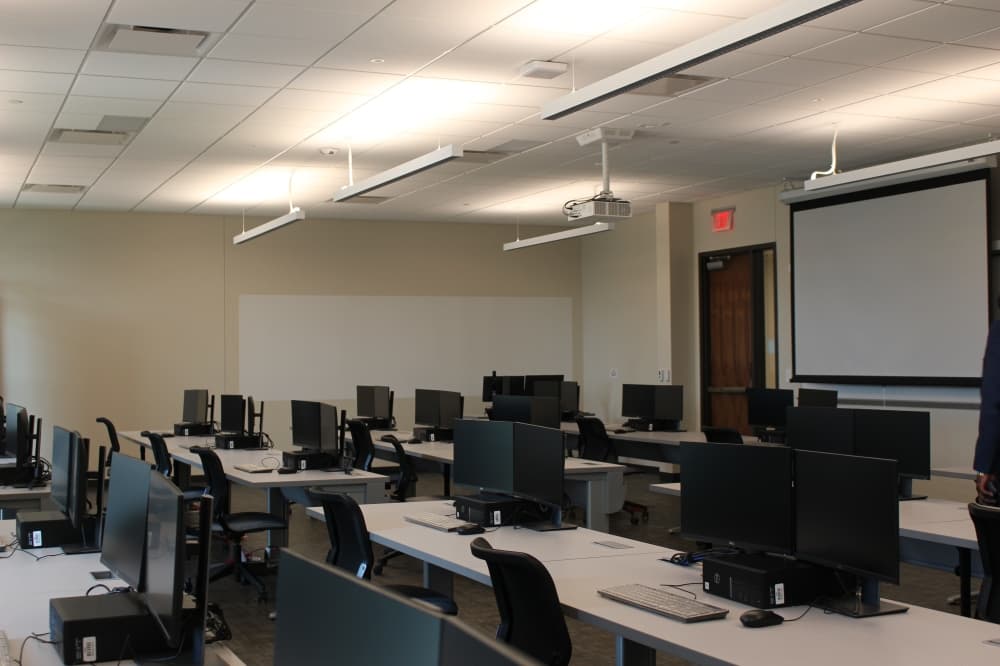 The IT Center's computer labs are equipped with whiteboards on each wall to encourage multiplatform learning. (Brooklynn Cooper/Community Impact Newspaper)