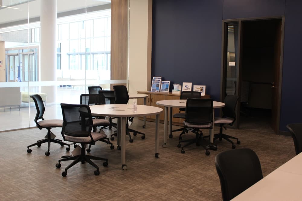 Students may wait for staff at these open tables in Collin College's career coaching lab located in the IT Center. (Brooklynn Cooper/Community Impact Newspaper)