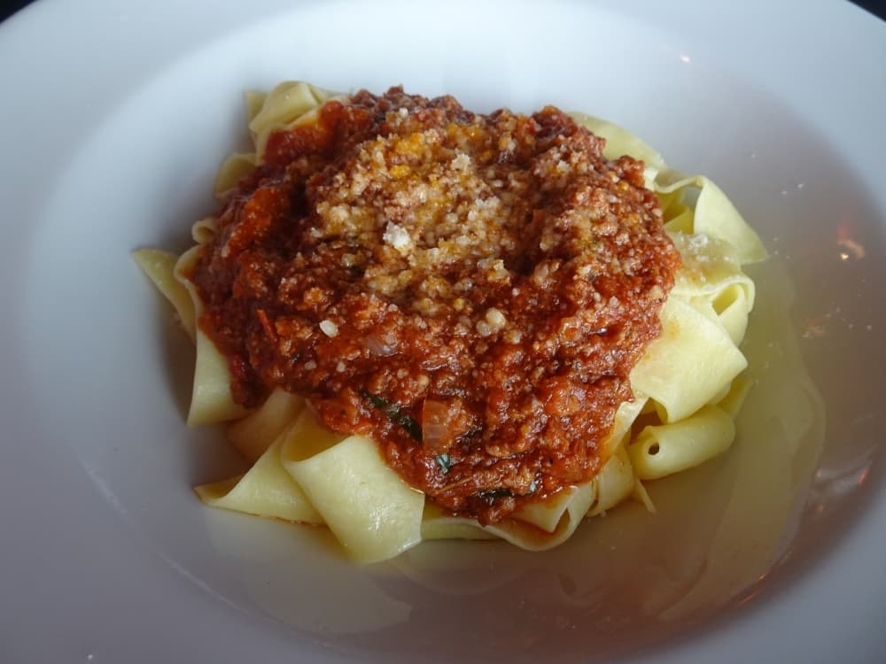 Pappardelle Bolognese is tossed with light veal, pork and beef bolognese sauce ($20). (Emily Jaroszewski/Community Impact Newspaper)