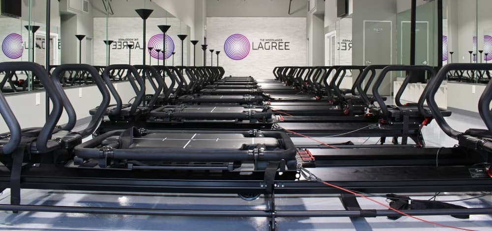 The Woodlands Lagree takes clients online by reservation as there is a set number of machines available. (Ally Bolender/Community Impact Newspaper)