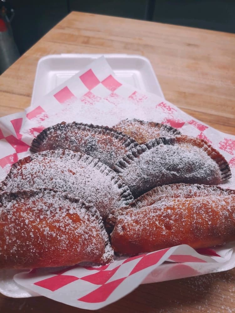 Damn Fine Coffee and Fried Pies offers six different flavors of sweet pies, which include peach cobbler, strawberry rhubarb, bananas foster pudding, caramel apple, coconut butter milk and chocolate pudding. Each pie is $5.50. (Courtesy Damn Fine Coffee and Fried Pies)