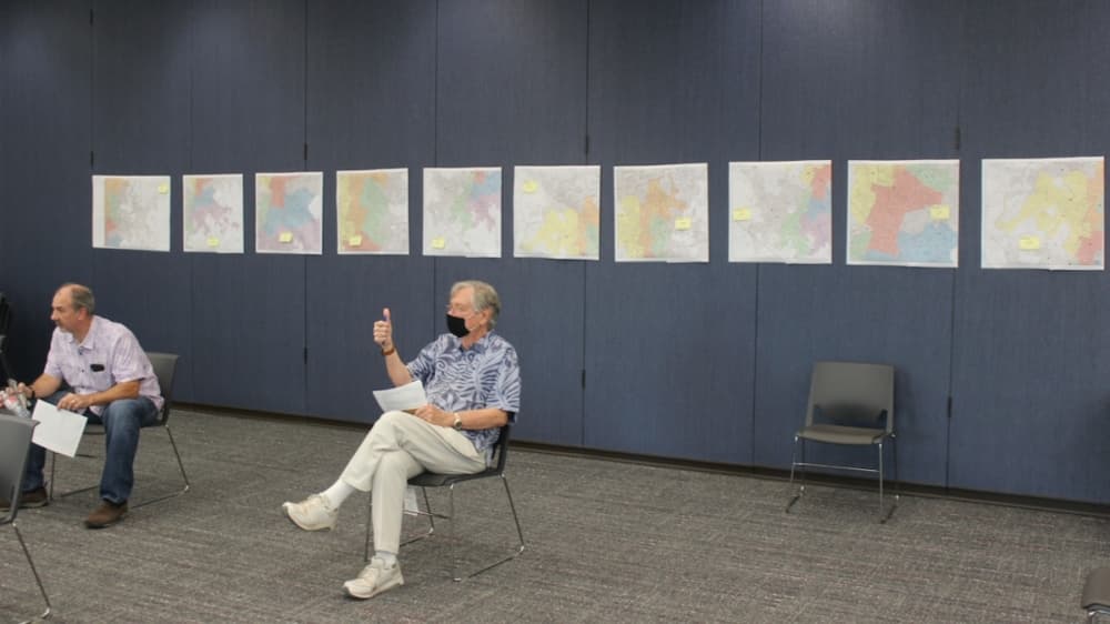 Several Allandale residents spoke to commission-approved map adjustments that would keep their neighborhood within a single City Council district. (Ben Thompson/Community Impact Newspaper)