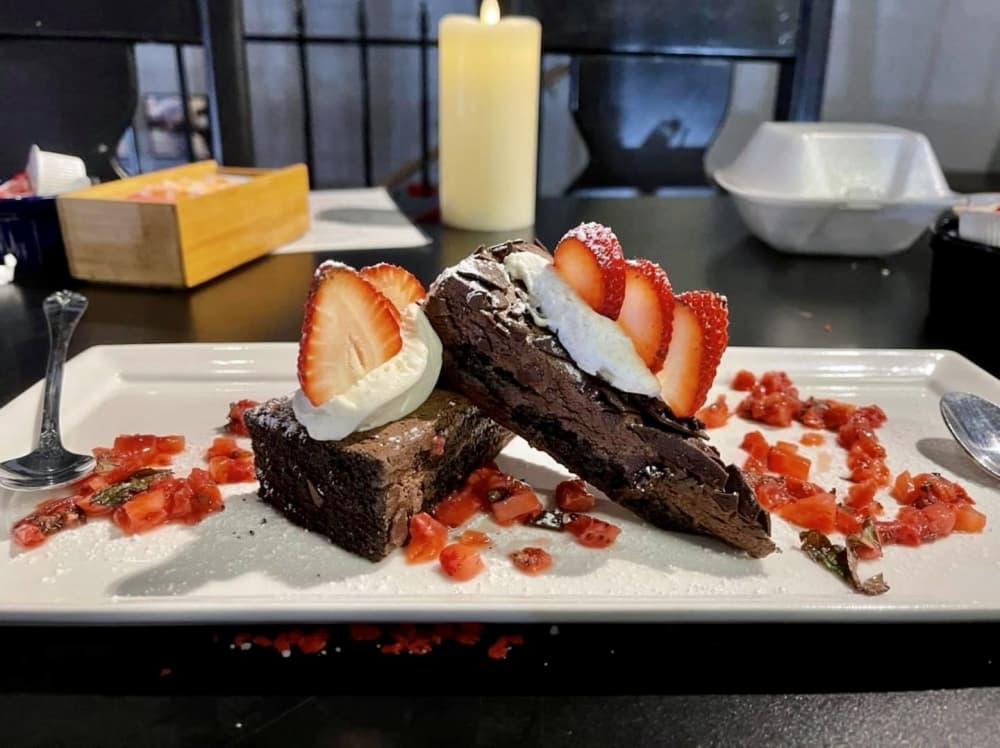 Fuego Latino offers a chocolate cake for two served with strawberries and cream. (Fuego Latino Gastropub)
