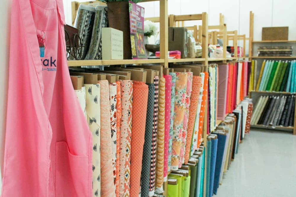 Fabric is sold by the yard both in store and online, starting at $7.99 per yard. (Emily Lincke/Community Impact Newspaper) 