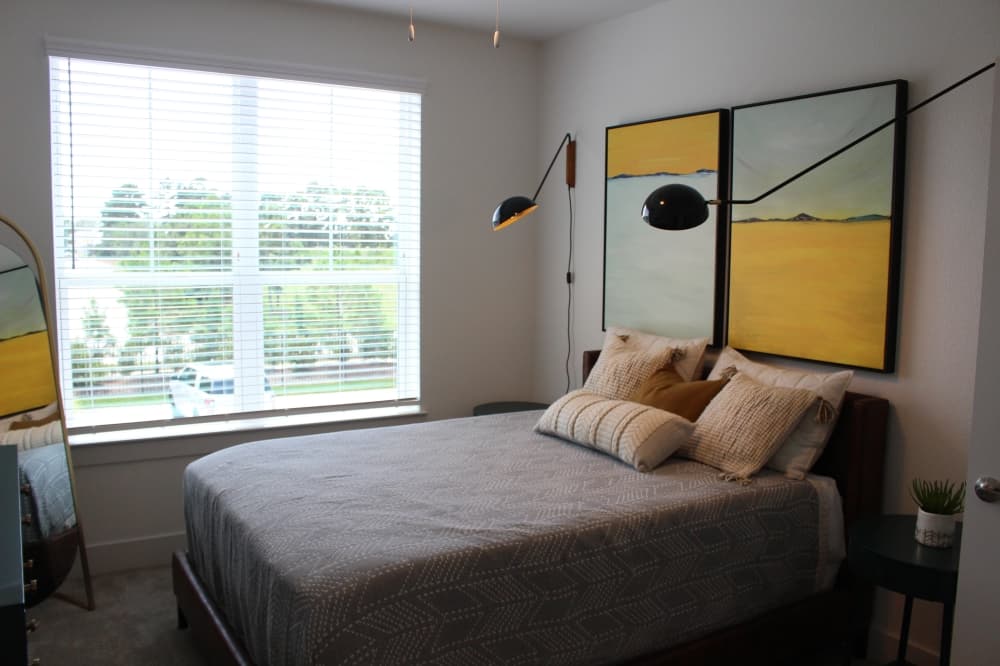 Bedrooms in Creekside Park The Grove feature large windows for natural lighting. (Andrew Christman/Community Impact Newspaper)
