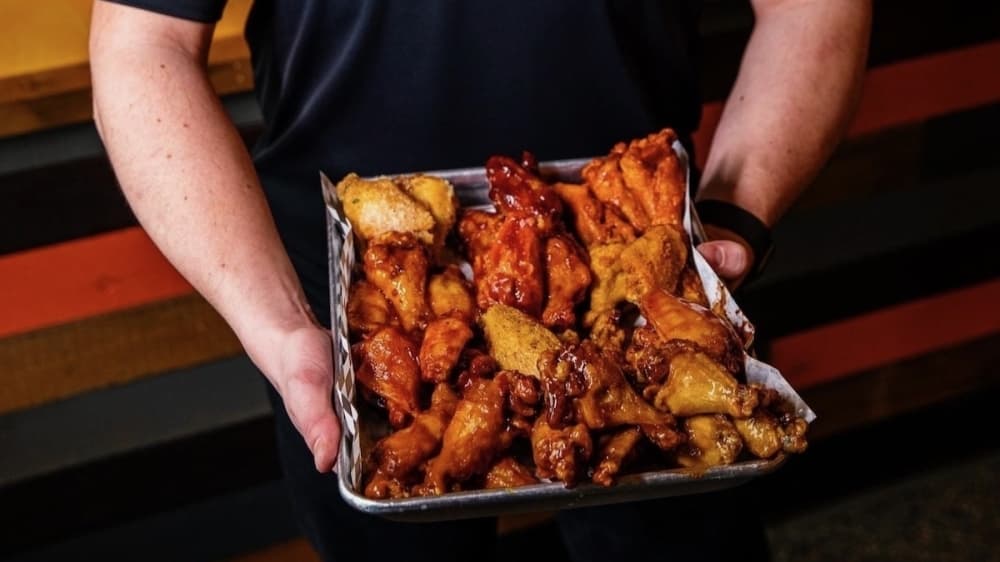 Wing Snob serving chicken wings, cheesecake in west Frisco