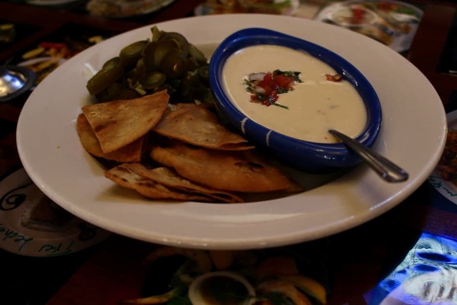 Hot queso ($4.99) is served with fresh tortilla chips and jalapenos. (Chandler France/Community Impact Newspaper)