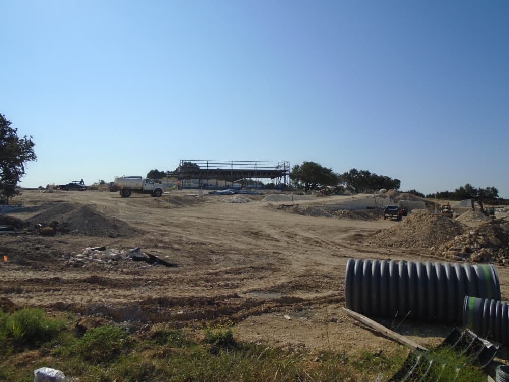 Covert car dealership west of Bee Cave advances to building construction