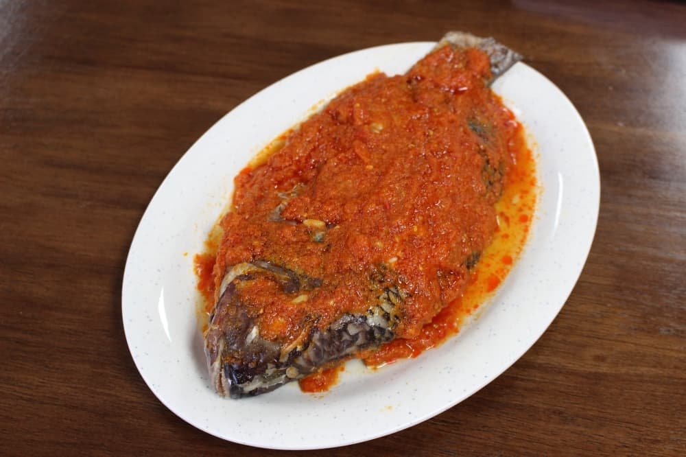 
The tilapia ($10) is covered in a tomato sauce with spices and onions.