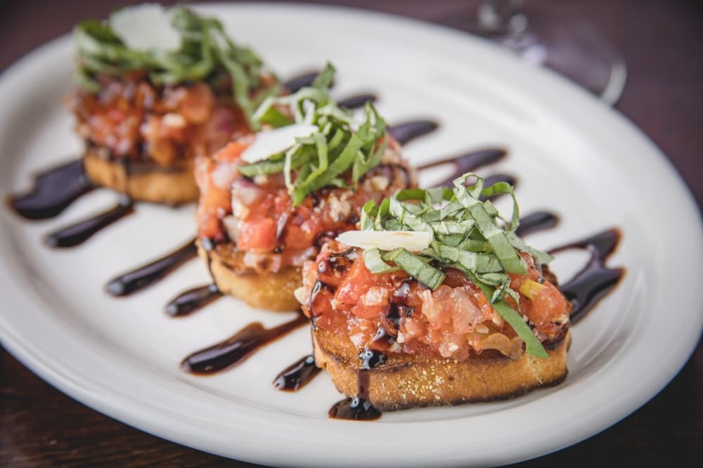 Roasted Garlic Bruschetta ($8) is one of the restaurant’s starter items. (Courtesy Fire Stone Pizza Bar)