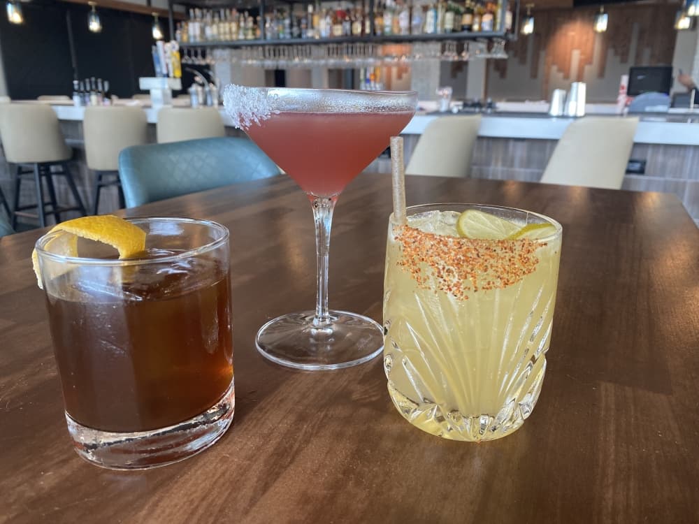 Popular drinks (from left) include the Fig Old Fashioned ($14), Rosallia’s Rita ($12) and Baja Sur Margarita ($14). (Ally Bolender/Community Impact Newspaper)