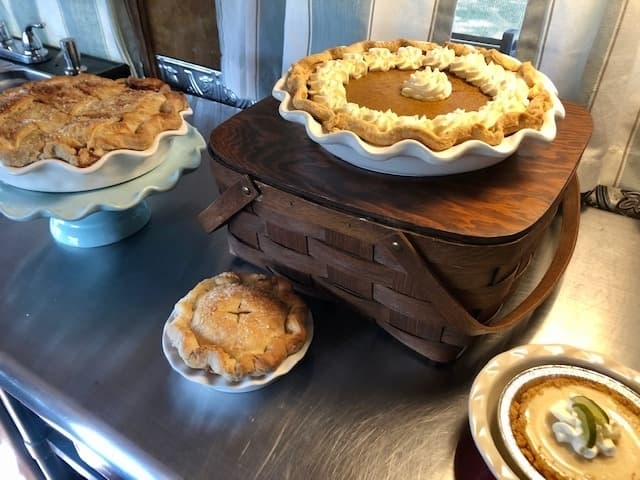Lulu’s Pie Shoppe features a variety of pies, including apple, left, and pumpkin, top right. (Brittany Andes/Community Impact Newspaper)