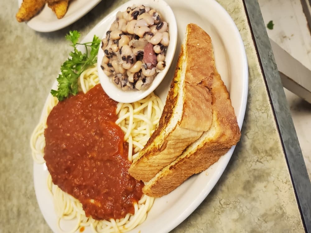 The spaghetti with meat sauce ($9.24) served with a choice of vegetables. 