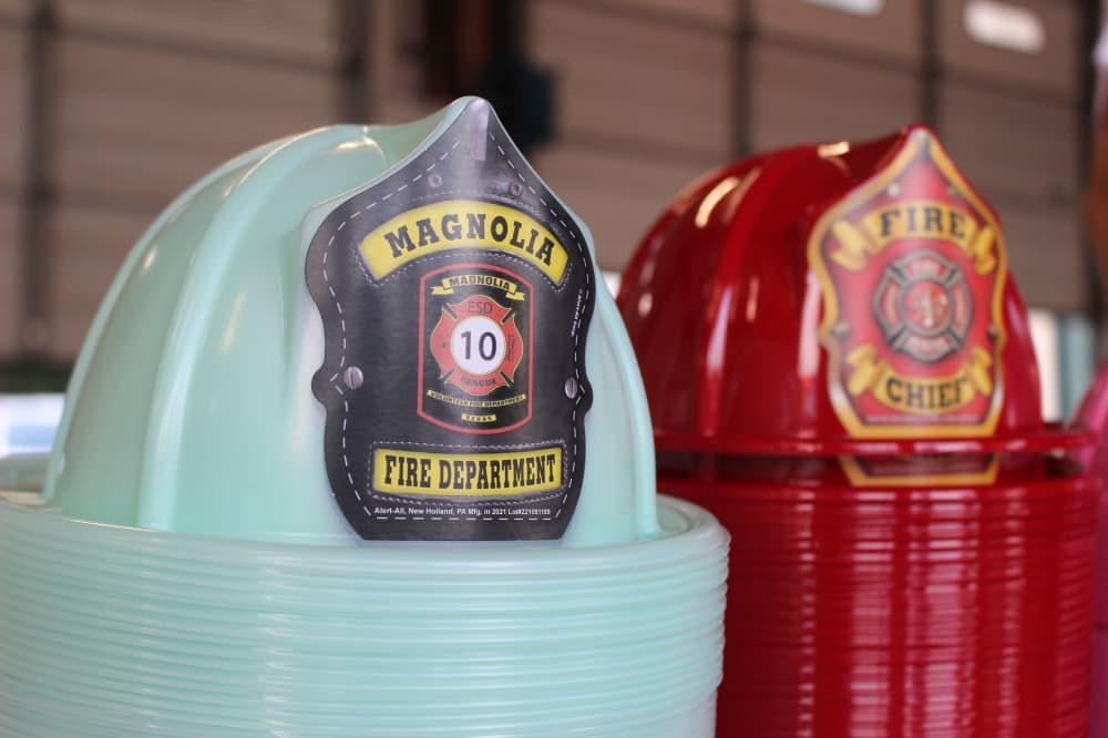 Children were able to take home fire hats provided by the department. (Chandler France/Community Impact Newspaper)