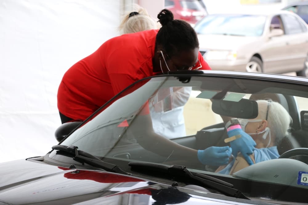 A nursing student administers COVID-19 vaccines during a mass vaccination event at Smart Financial Center in Sugar Land. The event was in partnership with Fort Bend County and Memorial Hermann Hospital.