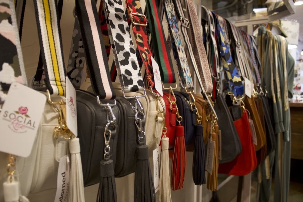 Social Rose sells these purses with interchangeable straps, allowing for customization. (Sandra Sadek/Community Impact Newspaper)