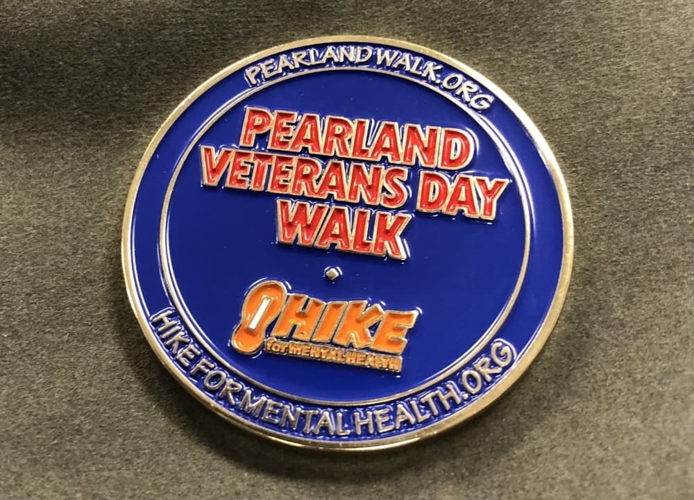 The back of the medal commemorates the Pearland Veterans Day Walk. (Andy Yanez/Community Impact Newspaper)