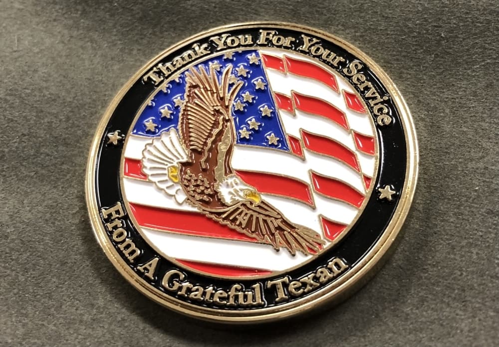 The 2021 medal thanks veterans. (Andy Yanez/Community Impact Newspaper)