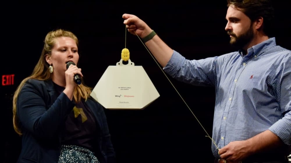 A pill-shaped component connects up to 3-pound packages to Wing's delivery drones. (Matt Payne/Community Impact Newspaper)