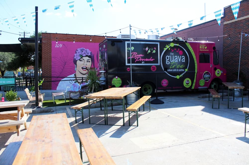 The Guava Tree's expansive patio is family and dog-friendly. It shares the patio space with neighboring cafe, Filtered, and often have live music on Saturday nights. (Karen Chaney/Community Impact Newspaper)