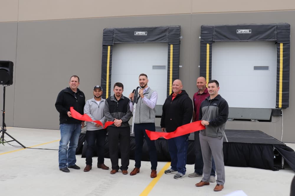 American HVAC Metals Supply Inc. representatives commemorate coming to Kyle with a ribbon cutting. (Zara Flores/Community Impact Newspaper)