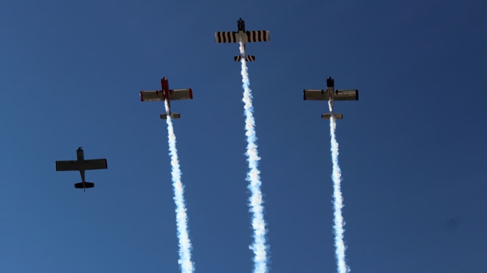 Four airplanes flew over Roanoke City Hall and Oak Street. (Sandra Sadek/Community Impact Newspaper)