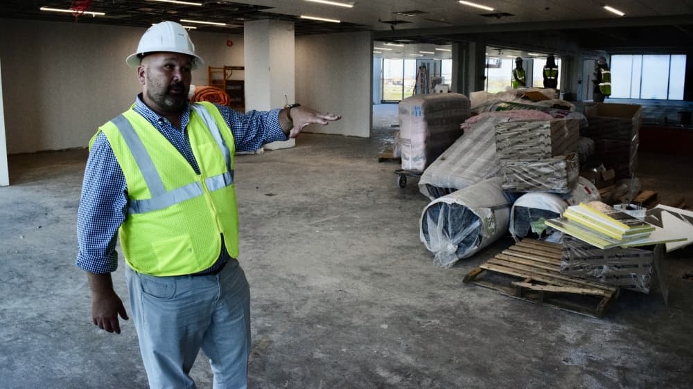 Project Manager John Newkirk showcases the second floor of the future PGA of America headquarters. It will house 109 work stations for some of the nearly 300 PGA employees. (Matt Payne/Community Impact Newspaper)