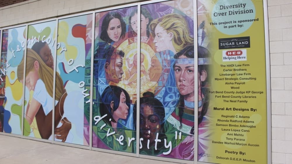 The "Diversity over Division" mural is located on the east windows of the UH at Sugar Land's Brazos Hall. (Claire Shoop/Community Impact Newspaper)