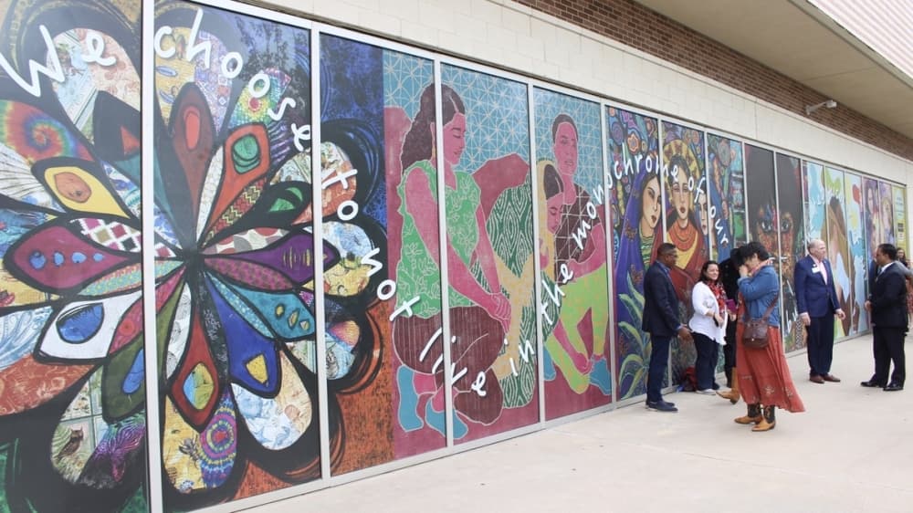 The "Diversity over Division" mural is located on the east windows of the UH at Sugar Land's Brazos Hall. (Claire Shoop/Community Impact Newspaper)