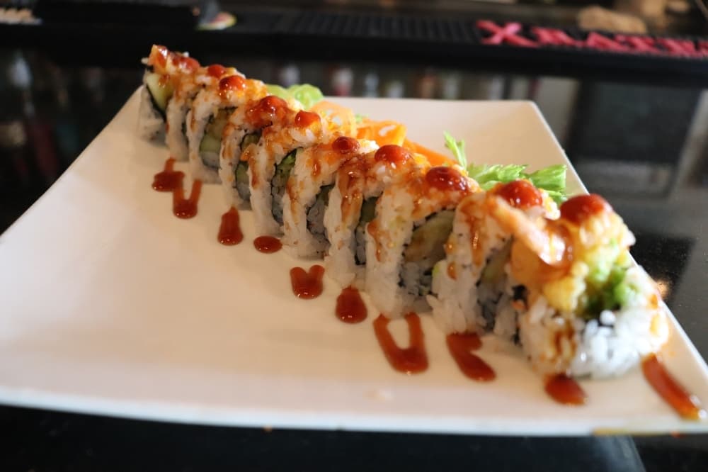 
The restaurant serves a variety of rolls, such as the shrimp tempura, avocado and cucumber roll topped with sriracha ($10).