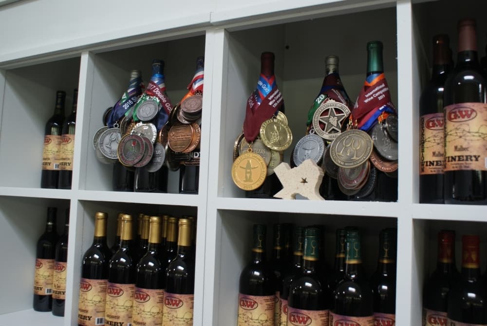 
Many of the medals Georgetown Winery has won at competition are on display behind the bar at the tasting room.