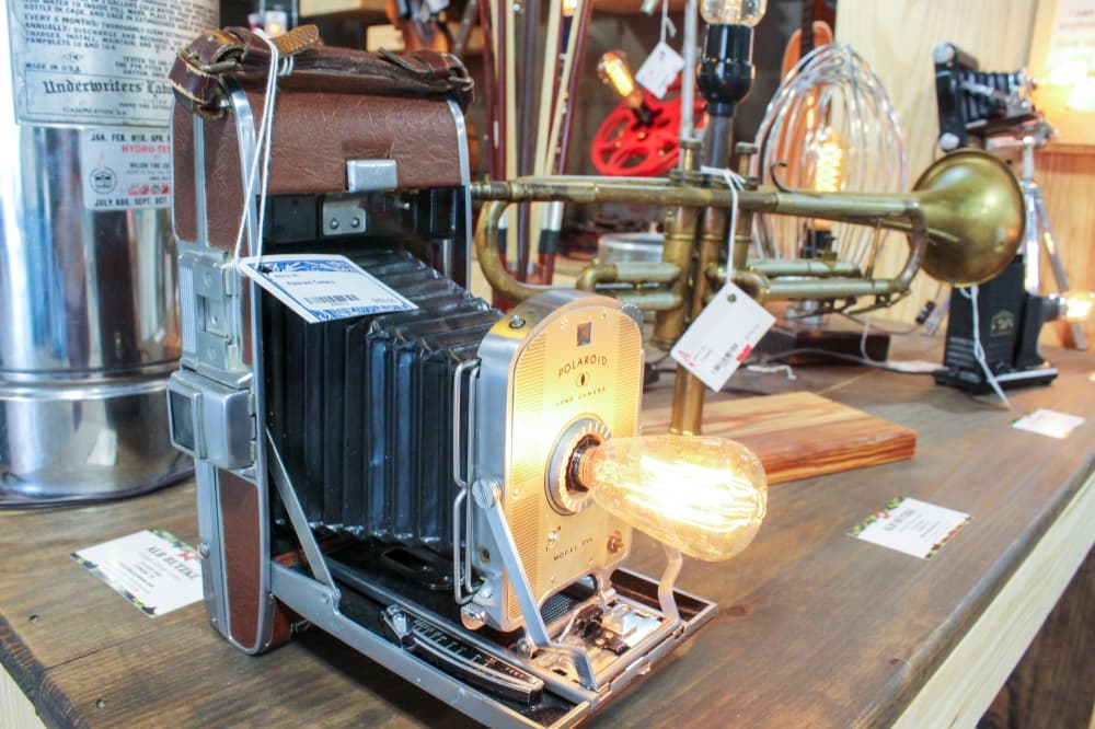 Cypress-based vendor Alb Butzke creates custom vintage lamps. (Hannah Zedaker/Community Impact Newspaper)