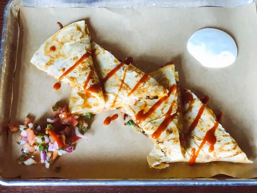 Brisket quesadilla ($13): A flour tortilla is filled with smoked brisket, mixed cheeses, bacon and pico de gallo. (Courtesy the Annex Crafthouse)