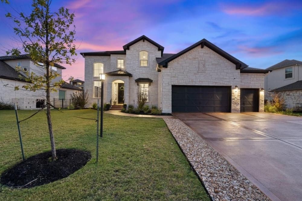 Active and on the market for $1.2 million, this two-story custom home built in 2020 has 5 bedrooms and 4.5 bathrooms located at 255 Baldovino Skyway. (Courtesy of Realty Austin)