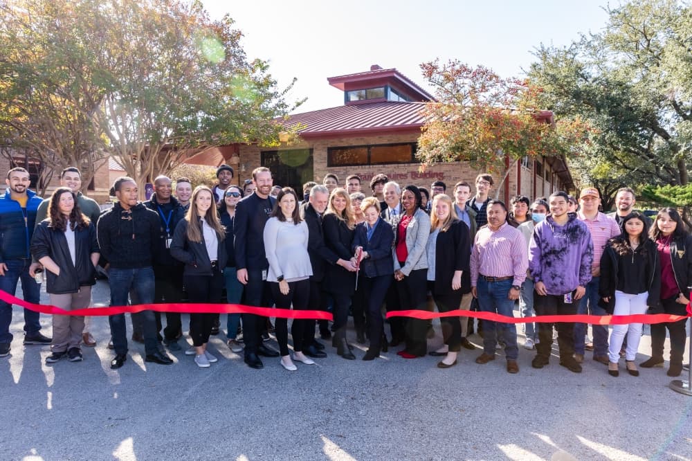 ACC Chancellor Richard Rhodes, Tesla representatives and Austin Mayor Steve Adler were present at a ribbon-cutting ceremony Nov. 19. (Courtesy Austin Community College)