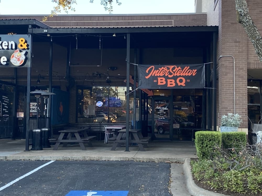 Interstellar BBQ keeps its fire pits lit 22 hours a day. (Trent Thompson/Community Impact Newspaper)