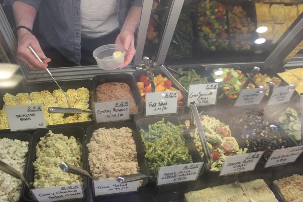 The deli case offers prepared foods, including deviled eggs, tuna salad and pasta salads. (Olivia Aldridge/Community Impact Newspaper)