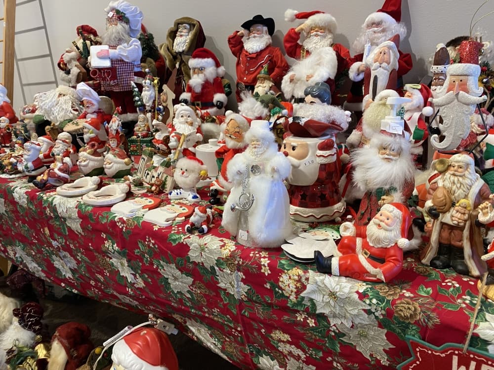 table full of Santas 
