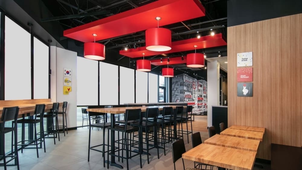 Bonchon's Addison location includes a variety of seating and decorative lighting fixtures. (Courtesy Emily Loving)