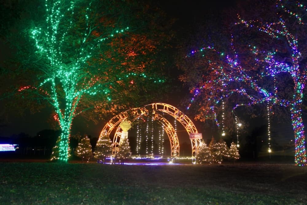 A replica Pennybacker Bridge is surrounded by lights. (Ben Thompson/Community Impact Newspaper)