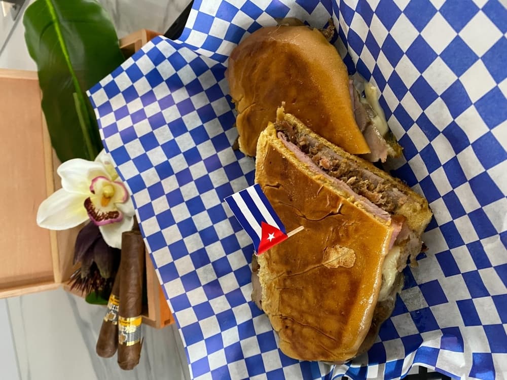 Media noche ($12) is a sandwich with ham, roasted pork, Swiss cheese, mustard and pickles, served on homemade bread. (Courtesy Yamilka Cortina)