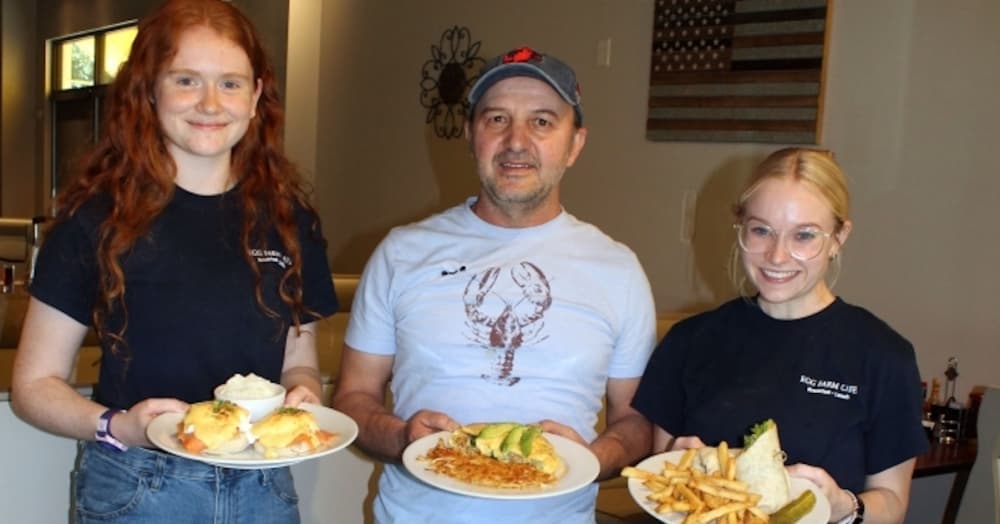 Egg Farm Cafe owner Rocky Begaj with staffers